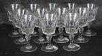 BACCARAT. Doze taças para licor em cristal francês , lapidação Piccadilly ( 1 com bicado e 1 com trincado). Alt. 11 cm.