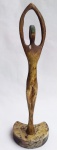 Escultura - Antiga escultura de mesa, confeccionada em bronze, com base de mármore, representando corpo feminino. Altura 26 cm.