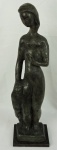 BRUNO GIORGI - Escultura em bronze representando "figura feminina", acompanha base de granito.Altura total 68 cm.