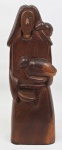 B.J.S. Arte Popular Brasileira, escultura em madeira nobre, representando "Nossa Senhora", assinada, medindo 40 cm de altura.