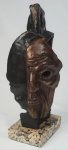 SALVADOR DALI. Escultura em bronze patinado em preto/marrom. Reprodução autorizada. Assinada e numerada 90/35. Base em granito. Medida total 36 x 13 x 10 cm.