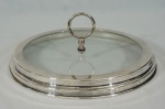 Petisqueira em metal espessurado a prata e vidro RIVA. Diâm. 38 cm.