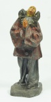 Escultura em ferro com mão e cabeça em marfim, rep. PIERROT, med 16 cm