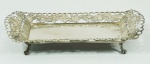 Salva em prata cont. P.Coroa com galeria vazada med. 10x22cm (parte do lote 273), peso 214 gr.