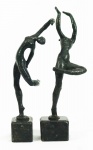 HUMBERTO COZZO. Lote composto de duas esculturas representando, "Dançarina", em bronze patinado, base de granito, (uma assinada). Alturas com base, 32 e 34 cm.