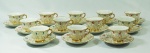 Lote contendo 12 xícaras para café com pires em porcelana de Meissen, decorado com dourações.