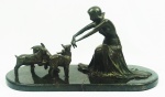 Escultura estilo Art Nouveau em bronze e base em granito , representando Dama com Cervos ( restaurada). Medidas 50 x 20 x 25 cm.