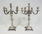 Par de candelabros em prata portuguesa, altura 61 cm, diâmetro 45 cm, peso aproximado, 9,680 grs.