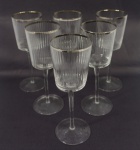 Conjunto de 6 (seis) taças em cristal frisado com borda prateada para vinho tinto. Medida: 22cm de altura.
