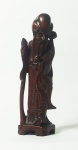 Grupo escultório em ébano representando velho sábio. Medida: 15cm.