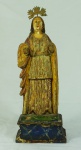 Imagem de Nossa Senhora em madeira com resquícios de policromia. Medida total (com resplendor): 35cm de altura. Faltam 2 (dois) dedos da mão esquerda.