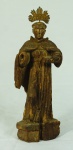 Imagem de Santo Antônio, sem o menino, em madeira com resplendor em metal. Medida: 26cm. Medida com resplendor: 28cm. Faltando mão direita.