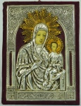 Ícone russo em prata e metal dourado. Medida: 23x16cm.
