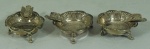 Trio de mini cinzeiros em prata feito com moeda de 1853. Medida: 5cm de diâmetro cada, 87g de peso total.