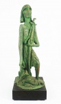 Escultura em barro patinado, representando São João, base em madeira . Assinado . Alt. total  70 cm.