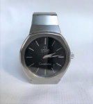 Relógio de pulso masculino, marca:  Omega Quartz. Modelo: Constellation, caixa 32 mm, pulseira em aço, fundo preto, mostrador sem numero, funcionando, acompanho elos sobressalentes da pulseira para ajuste.