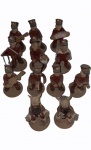 ADALTON. "Folia de Reis", Niteroi-RJ, 12 figuras masculinas em cerâmica, medindo em média 13 cm de altura. Contem restauros. Assinado e datado.