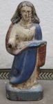 Imagem em madeira policromada representando Santa Luzia . No estado ( mão colada). Alt. 19 cm .