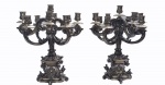 Par de candelabros em prata portuguesa, contrastada , para  9 velas ,ricamente trabalhada  com flores, volutas e medalhões . Alt. 52 cm cada. Peso aprox. 16 kg.