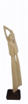 Escultura em marfim  representando Africana  com cabaça com base em madeira. Alt. total 21 cm.