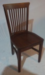 Cadeira em madeira, encosto em ripas, assento em madeira maciça, medindo 56x40x39cm.