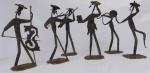 Grupo escultórico israelita, representando banda de músicos ortodóxos em ferro. Assinado por autor não identificado, medindo 24 cm cada músico. Obs.: no estado. RETIRADA EM COPACABANA COM AGENDAMENTO.