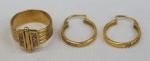 Conjunto de par de brincos e anel em ouro e brilhantes . Peso total 8.7 gr. Aro 16.