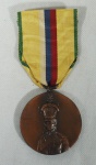 Medalha Comemorativa do Centenário de Maria Quitéria, conferida ao Capitão de Mar e Guerra Heitor Doyle Maia, em 23/8/54. Acompanha diploma.