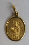 Medalha em ouro amarelo, contrastado 18k, representando São Paulo, peso 0.70g, medida aproximada 15mm.