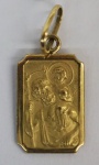 Medalha em ouro amarelo, contrastado 18k, representando São José, peso 0.95 g, medida aproximada 15mm.