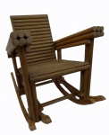 Pequena cadeira de balanço em madeira nobre .Década de 70. Medidas 60 x 60 x 65 cm.