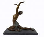 G.ZAMPOL. Escultura em bronze patinado representando Bailarina. Base pedra ( alguns bicados). Medida total 50 x 56 x 17 cm.
