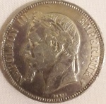 Moeda em prata, 5 FRANC  NAPOLEON III EMPEREUR, França, 1868. Anverso: Napoleão e a inscrição "NAPOLEON EMPEREUR". Reverso: "EMPIRE FRANÇAIS". Peso: 24,83 g. Tamanho:  aprox. 3,5 X 3,5 cm.