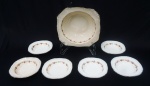Saladeira com 6 bowls de faiança , decoração floral . No estado ( marcas do tempo ).