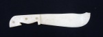 Abridor de cartas em marfim no formato de adaga ( ponta com lascado). Comp. 17 cm.
