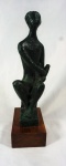BRUNO GIORGI . Escultura em bronze patinado, representando "Orfeu", medindo 24 cm, assinado B.G na lateral, base em madeira, medida total 27,5 cm.