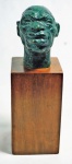 HUMBERTO COZZO. " Cabinet de Zumbi dos Palmares". Escultura em bronze patinado, assinado no verso, medindo aprox.5 cm. Base em madeira. Medida total 14.5 cm