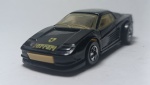 Mattel HotWhells, Ferrari Testarosa 1984, die-cast, preto e dourado, escala 1/64.