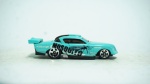Hot Wheels- AT-A-Tude Mosquito, azul claro, modelo metal die-cast, med 7,5 x 3 cm.