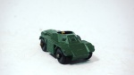 Lesney- miniatura de tanque Ferret Scout Car N 61, acompanha personagem- feito na Inglaterra- cor: verde militar- modelo metal die-cast - med 5 x 2,5 cm.