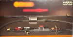 Marklin mini club N 8167 contendo 4 trens, miniatura de casa,  bateria e diversos trilhos de diferentes tamamnhos para a a escala N- 20 trilhos retos, 22 trilhos curvados ( em vários ângulos) e 4 biforcações. ( feito na Alemanha Ocidental) Acompanha caixa original e manual de instruções.