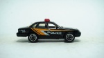 Matchbox- Ford Crown Victoria Police D-22, 1996, escala 1/70, preto e laranja,  modelo metal die-cast, med 7 x 2,5 cm.